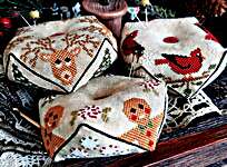 Click for more details of Christmas Biscornu Trio 2024 (cross stitch) by puntiniputini