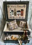 Click for more details of 'The Welcome Street' Sewing Box (cross stitch) by Mani di Donna