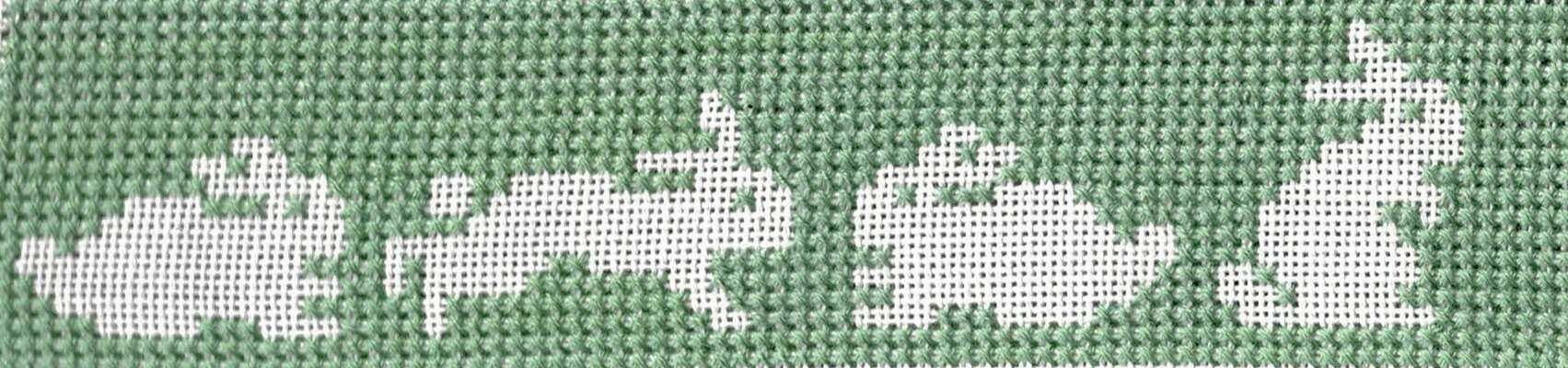 Click for more details of White Rabbits (cross stitch) by Anne Peden